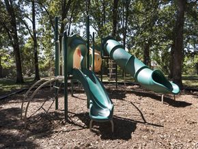 Fayetteville apartment for rent - a playground with slides at a park