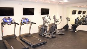 Perth Amboy apartment for rent - a group of exercise machines in a gym