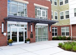 Perth Amboy apartment for rent - the entrance to a building with large glass doors