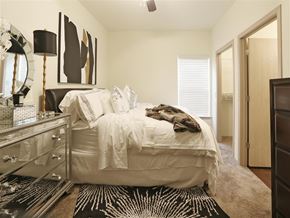 Benton apartment for rent - a bedroom with a bed and a dresser