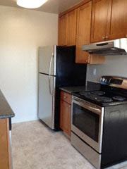San Francisco apartment for rent - a kitchen with a stove and a refrigerator