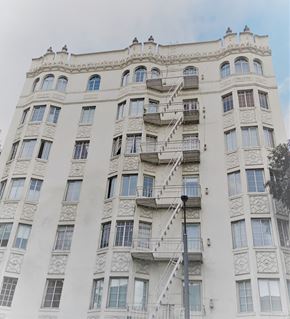 San Francisco apartment for rent - a large white building with stairs on the side of it