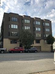 San Francisco apartment for rent - a building on a street with cars parked in front of it