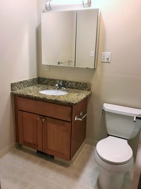 San Francisco apartment for rent - a small bathroom with a sink toilet and a mirror