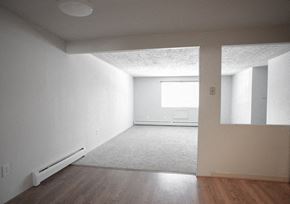 Meriden apartment for rent - an empty room with white walls and wooden floors