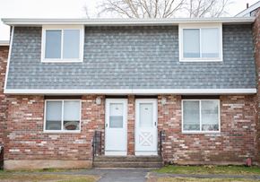 Meriden apartment for rent - the front of a brick house with two doors