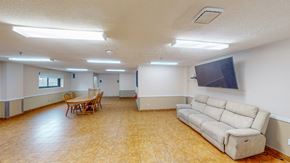 Malden apartment for rent - A living room with a couch, chairs, and a television.
