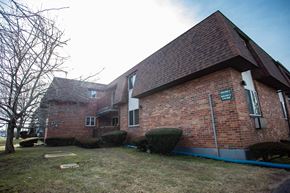 Meriden apartment for rent - a view of the side of a brick house
