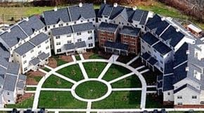 Hartford apartment for rent - an aerial view of a large mansion with a green lawn
