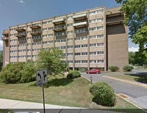 Meriden apartment for rent - an apartment building with a red car parked in front of it
