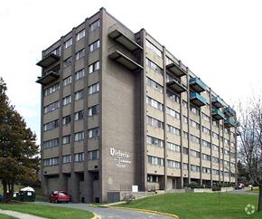 Meriden apartment for rent - a building with a red car parked in front of it