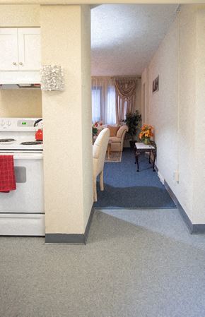 New Haven apartment for rent - a kitchen and living room with a white stove and refrigerator