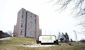 New Haven apartment for rent - a sign living in front of a tall building