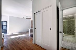 New York apartment for rent - an empty room with a closet and a ceiling fan