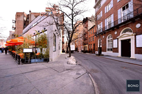 New York apartment for rent - a street view of a city street with buildings