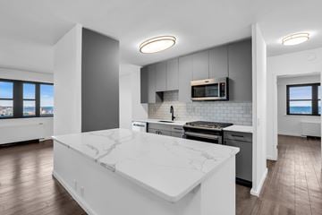 Atlantic Highlands apartment for rent - A modern kitchen with a large island in the center.