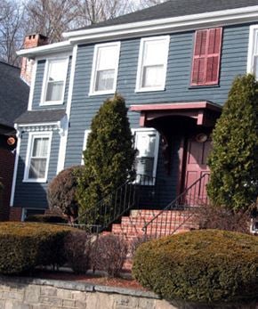 Norwich apartment for rent - a blue house with a red door and a staircase
