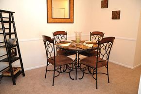 Leesburg townhouse for rent - a dining room with a table and chairs