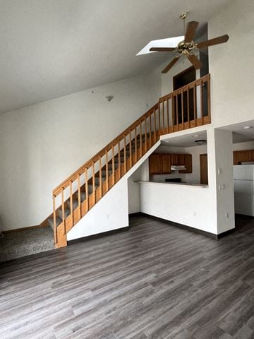 Reedsburg apartment for rent - the living room is open to the kitchen and stairs to the loft