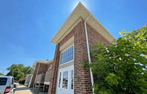 Madison apartment for rent - the front of a brick building with a white door
