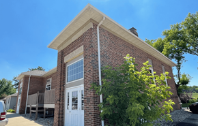 Madison apartment for rent - the front of a brick building with a white door