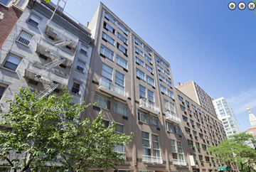 New York apartment for rent - a tall building with a tree in front of it