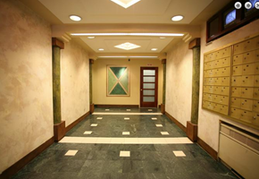 New York apartment for rent - a hallway with lockers and a door in a building
