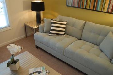 Durham apartment for rent - a living room with a couch and a table