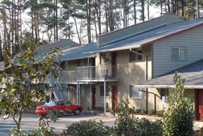 Durham apartment for rent - a house with a red car parked in front of it