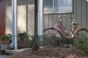 Durham apartment for rent - a pink bike parked in front of a building