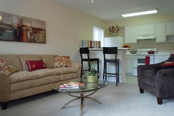 Durham apartment for rent - a living room with a couch and a table