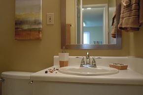 Durham apartment for rent - a bathroom with a white sink and a mirror