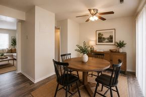 Windsor Mill townhouse for rent - A dining room with a table set for two.