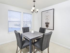 Columbus apartment for rent - A dining room with a table and chairs.