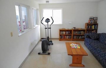 La Grande apartment for rent - a living room with a treadmill and a coffee table