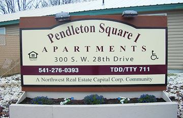 Pendleton apartment for rent - a sign for pendleton square apartments in front of a building