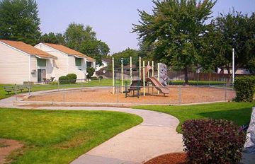 Boise apartment for rent - a park with a playground and houses