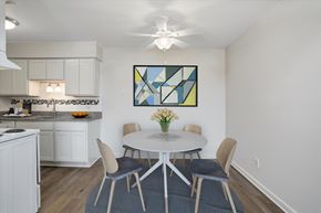 Belleville apartment for rent - A kitchen with a dining table and chairs.