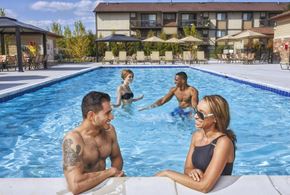 Belleville apartment for rent - A group of people are enjoying a day at the pool.