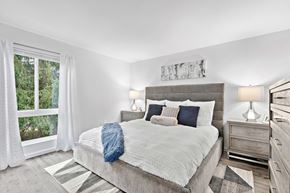 Plainsboro Township apartment for rent - a bedroom with a bed and a large window