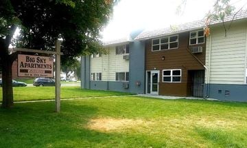 Billings apartment for rent - an apartment building with a big sky apartments sign