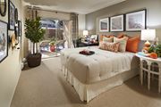 Fremont apartment for rent - Model bedroom with over-sized windows at Creekside Village Apartments in Fremont.