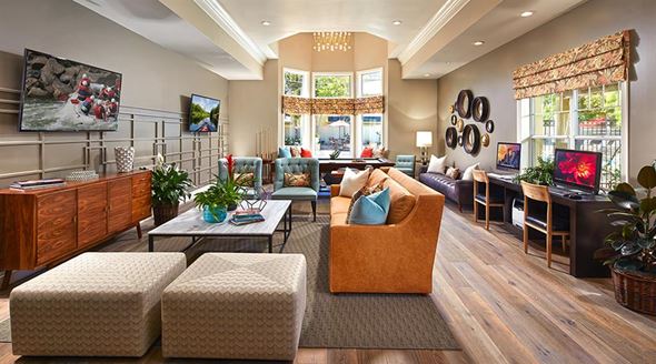 Newark apartment for rent - Resident lounge with a kitchen, bar-height dining, entertainment and gaming TV areas and billiards table at Sycamore Bay apartments in Newark.