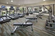Irvine apartment for rent - Fitness center amenity with cardio machines at Woodbridge apartments in Irvine.