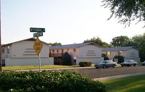 Billings triplex for rent - a street sign in front of a house