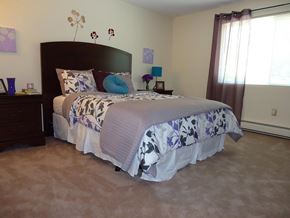 Milford apartment for rent - a bedroom with a bed and a window