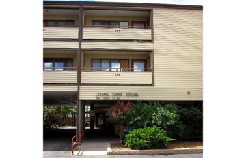 Laramie apartment for rent - a building with a sign on the side of it