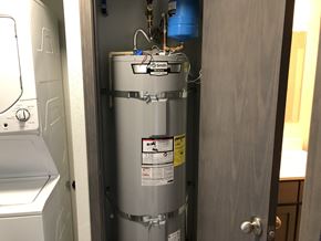 Everett apartment for rent - A water heater is installed in a room.