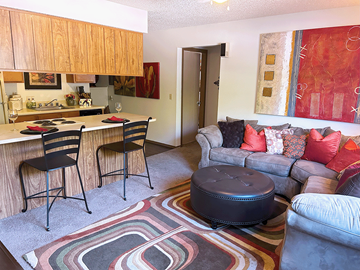 Rogers apartment for rent - a living room with a couch and a table