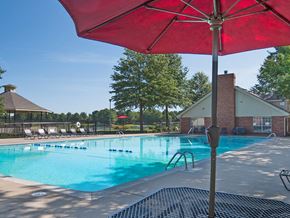 Lowell apartment for rent - our apartments have a resort style pool with chairs and an umbrella